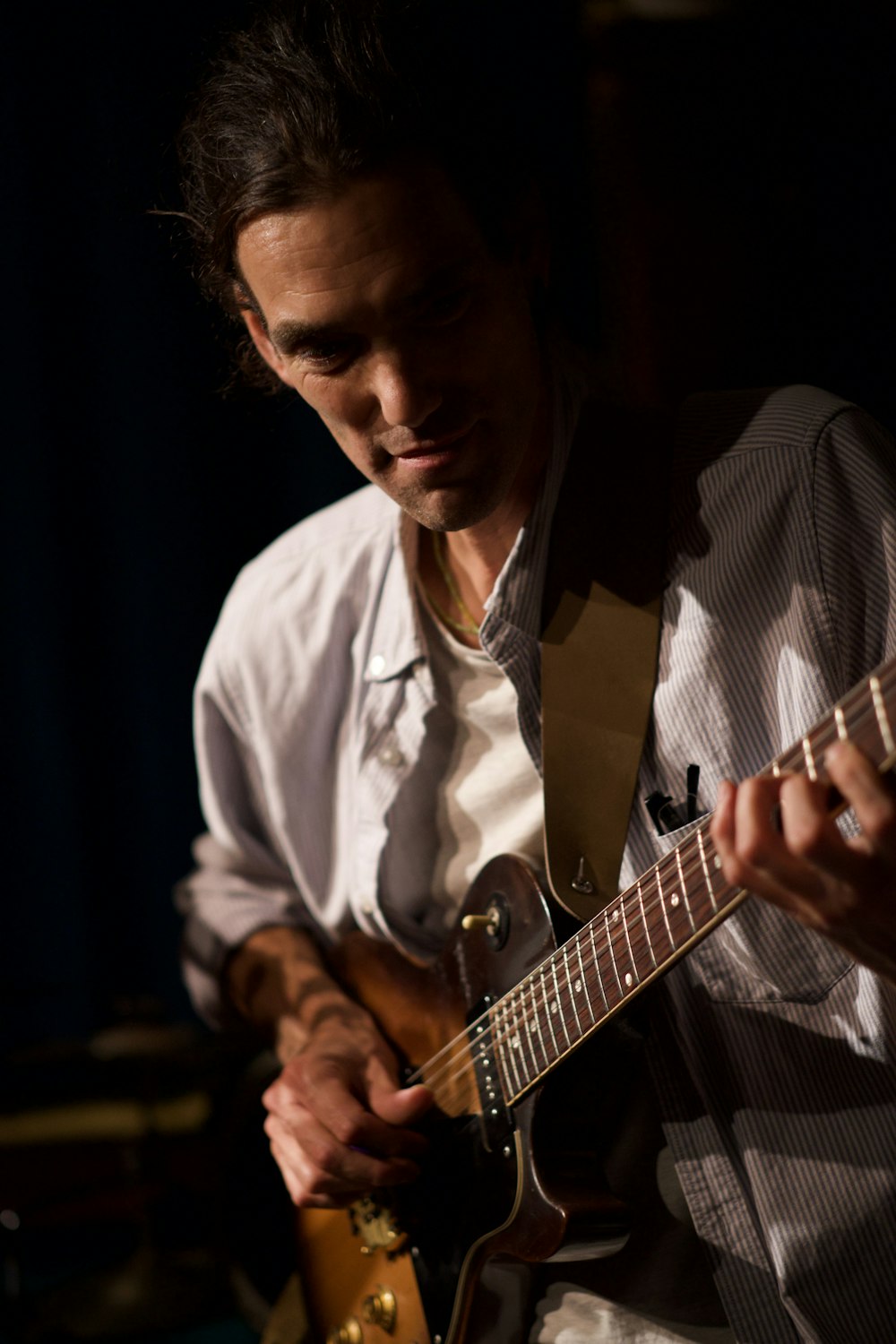 man playing guitar