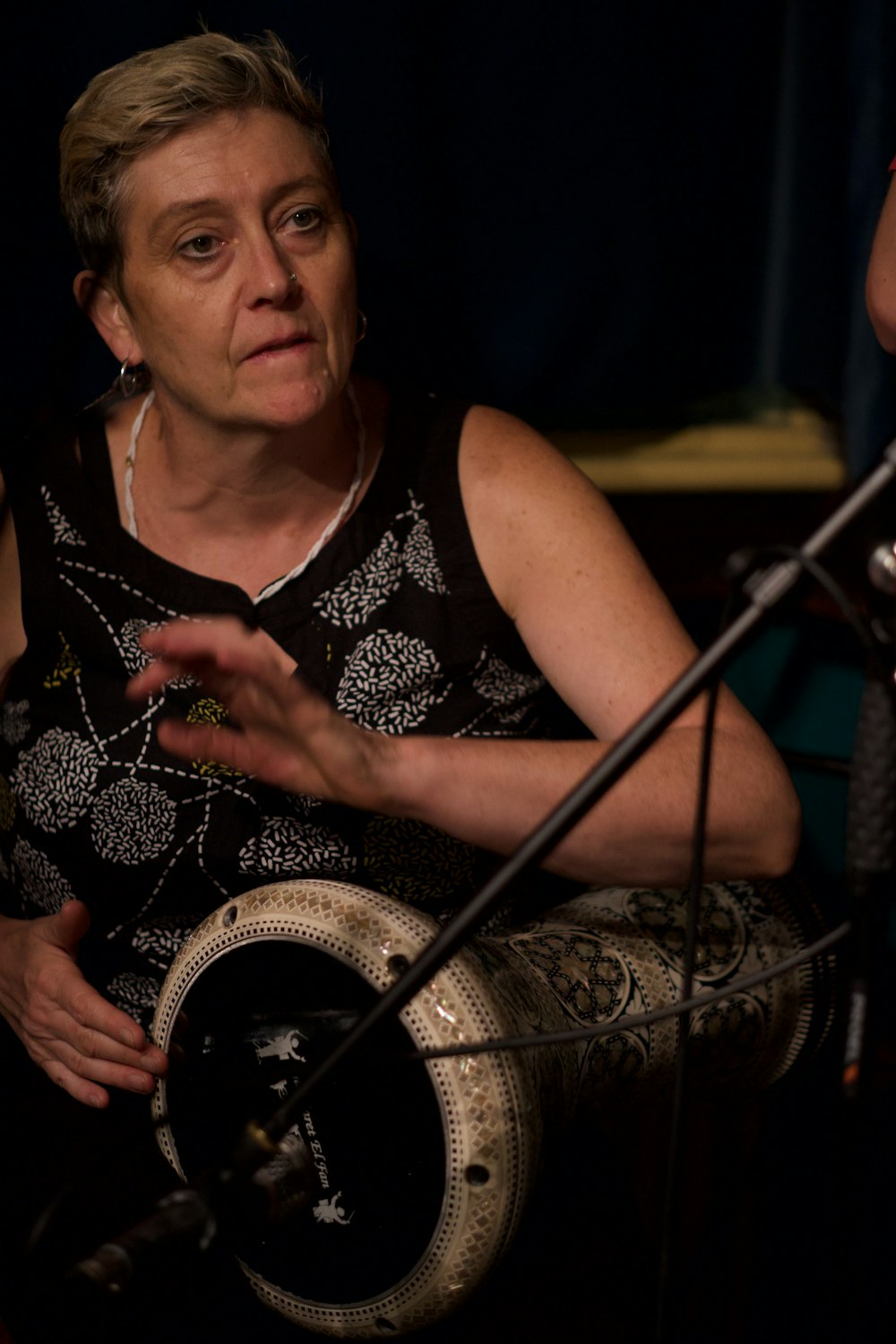 woman playing darbuka