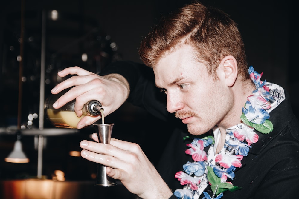 man making liquor