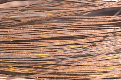 Close-up of shiny copper wires and rusted iron pieces ready for recycling.