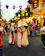 A lively Cajun street scene with colorful lanterns and festive decorations.