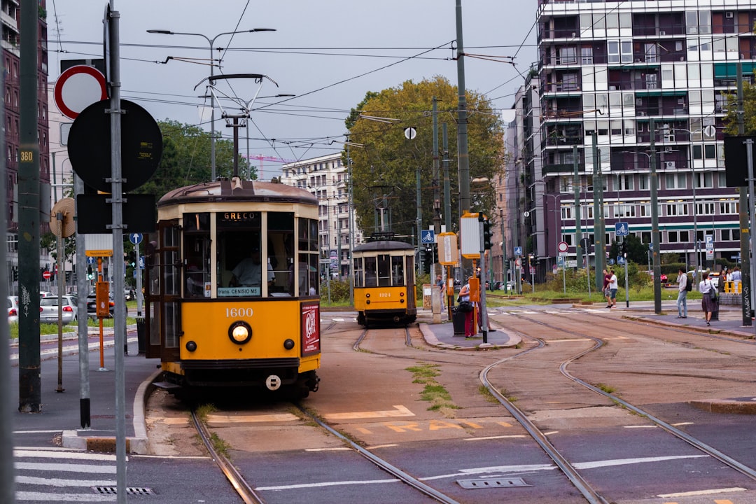 yellow and black city tram,