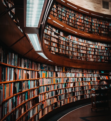 photo of brown wooden bookshelf