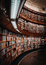 photo of brown wooden bookshelf
