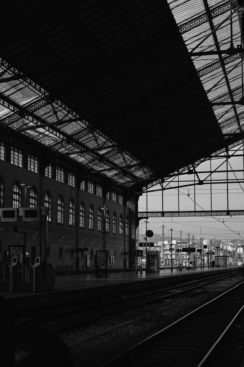 grayscale photography of train station