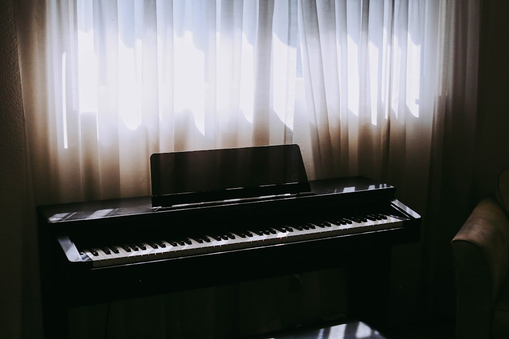 piano beside window