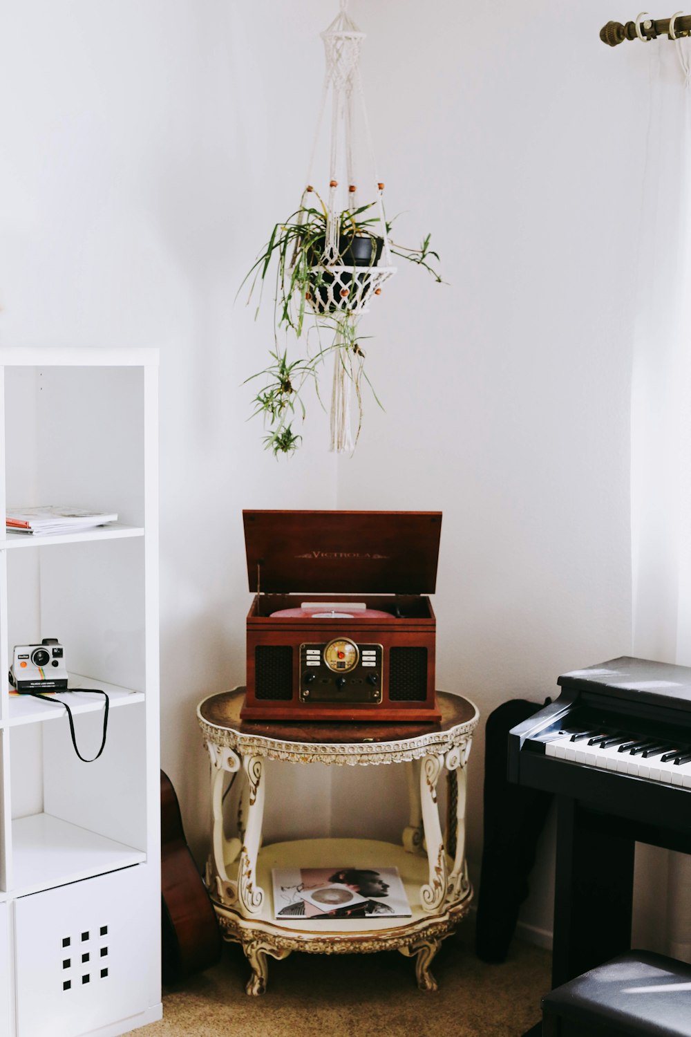 a small table with a record player on top of it