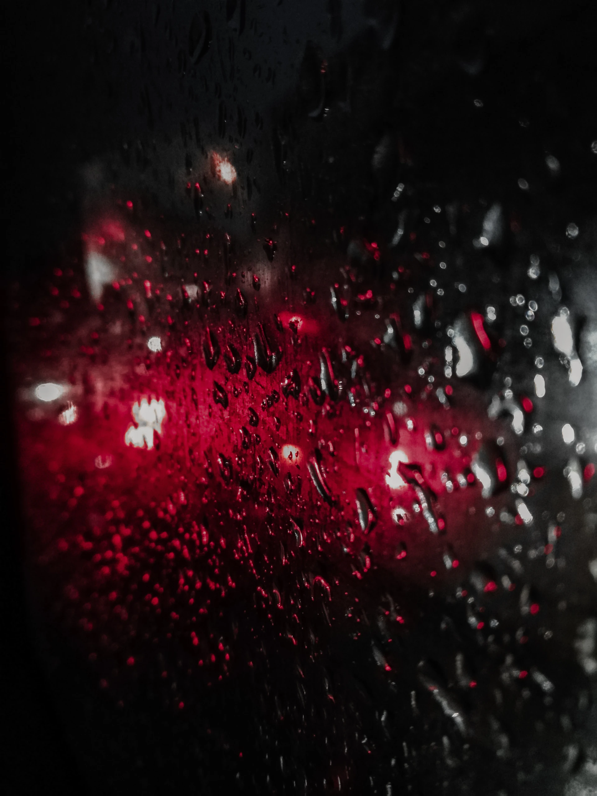 rain drops on the windshield of a car