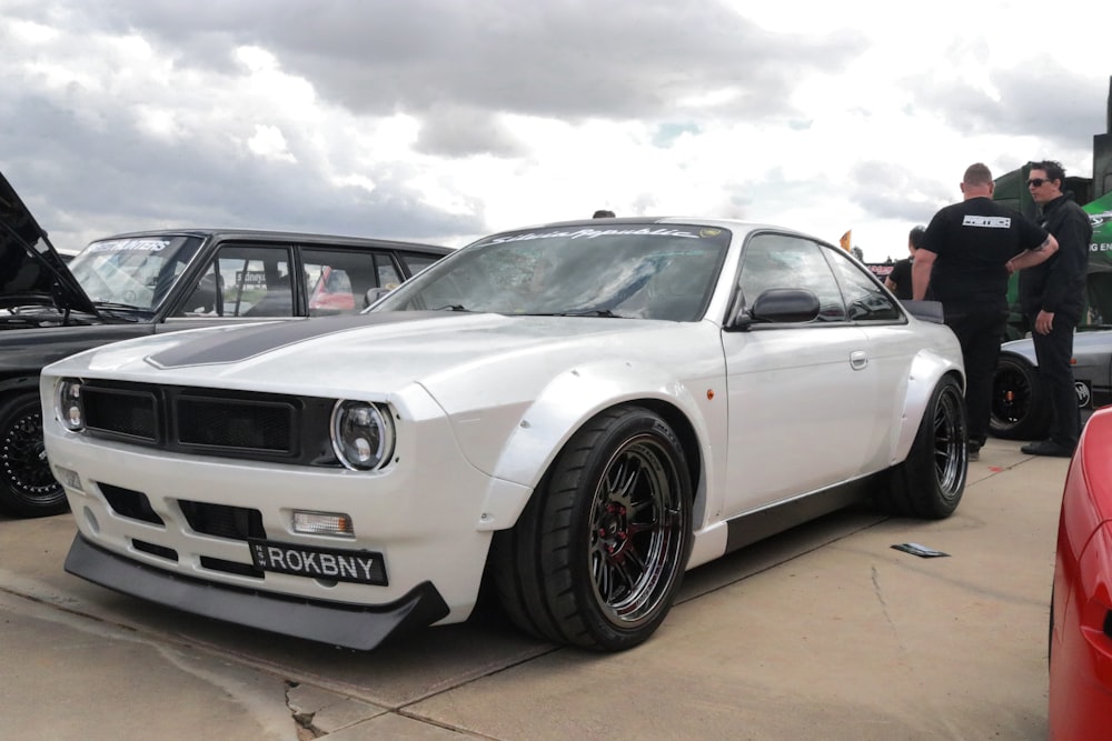 white sports coupe