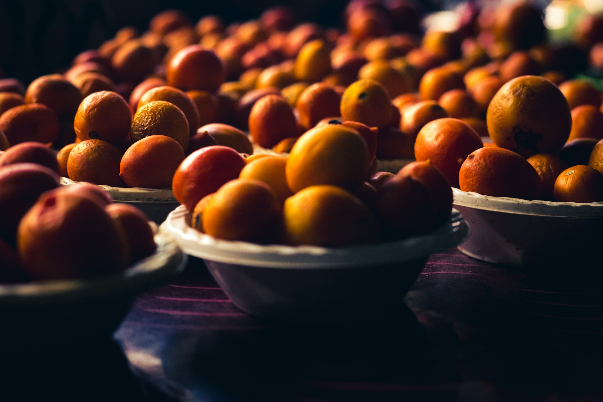 woman wearing yellow long-sleeved dress under white clouds and blue sky during daytime