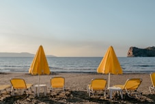 yellow patio umbrellas at daytime