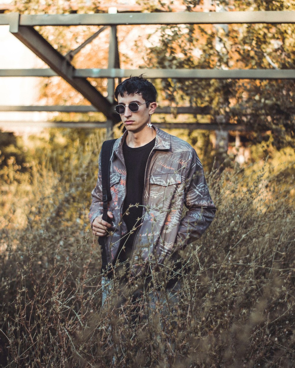 man standing on grass