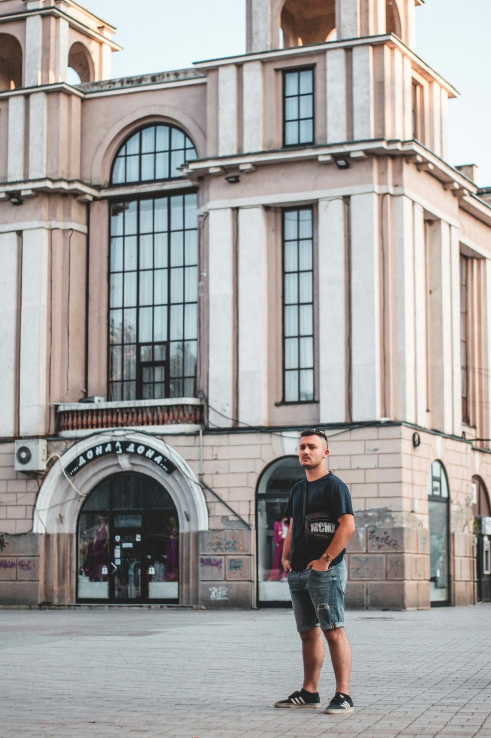 man in black crew-neck T-shirt