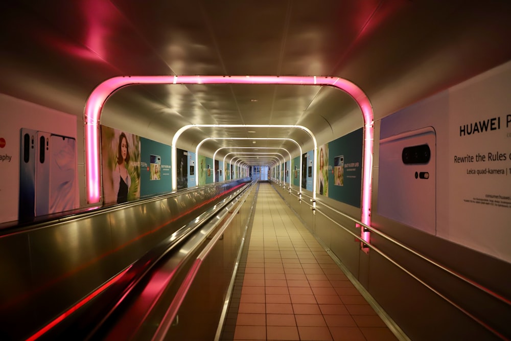tunnel with advertisement posters and lights