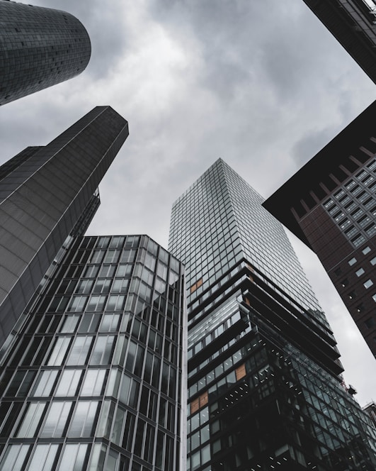 a group of tall buildings standing next to each other