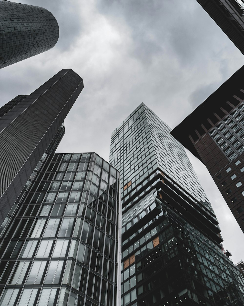 a group of tall buildings standing next to each other