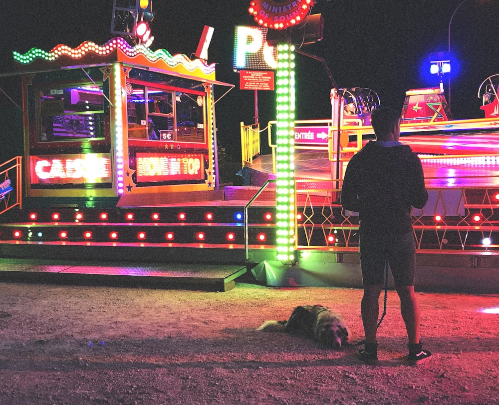 person looking at amusement. rides