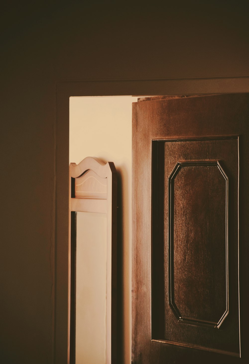 a close up of a door and a mirror