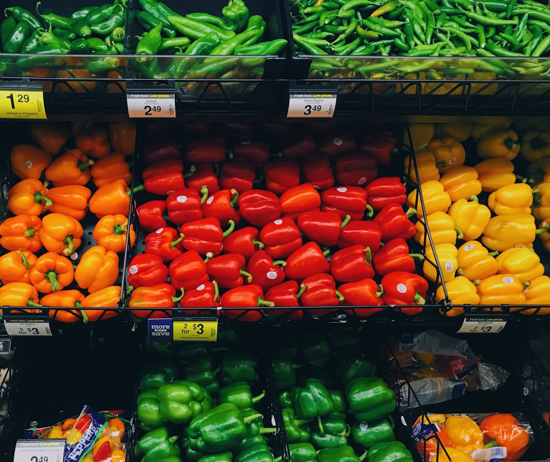 pile of bell peppers and beans at the grocery,