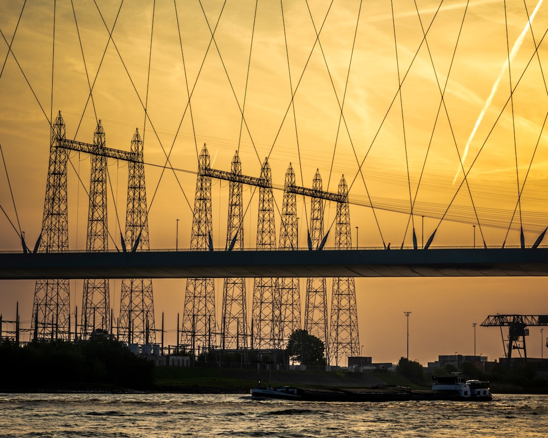 silhouette of bridge during daytime