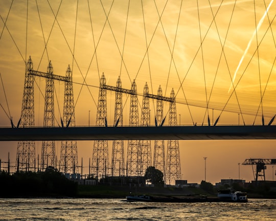 silhouette of bridge during daytime in Nijmegen Netherlands
