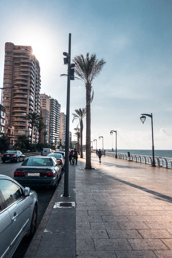 vehicles beside sidewalk at daytimeby Michal GADEK