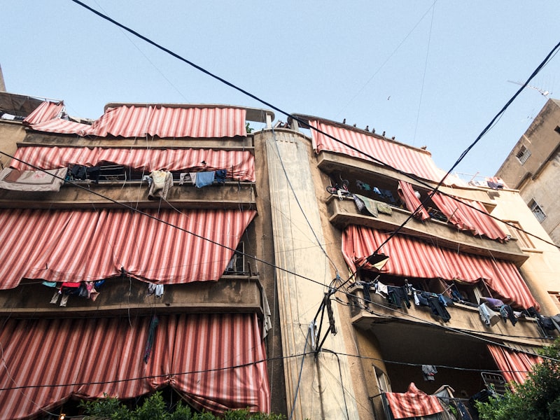 Residential building with striped awnings in Beirut