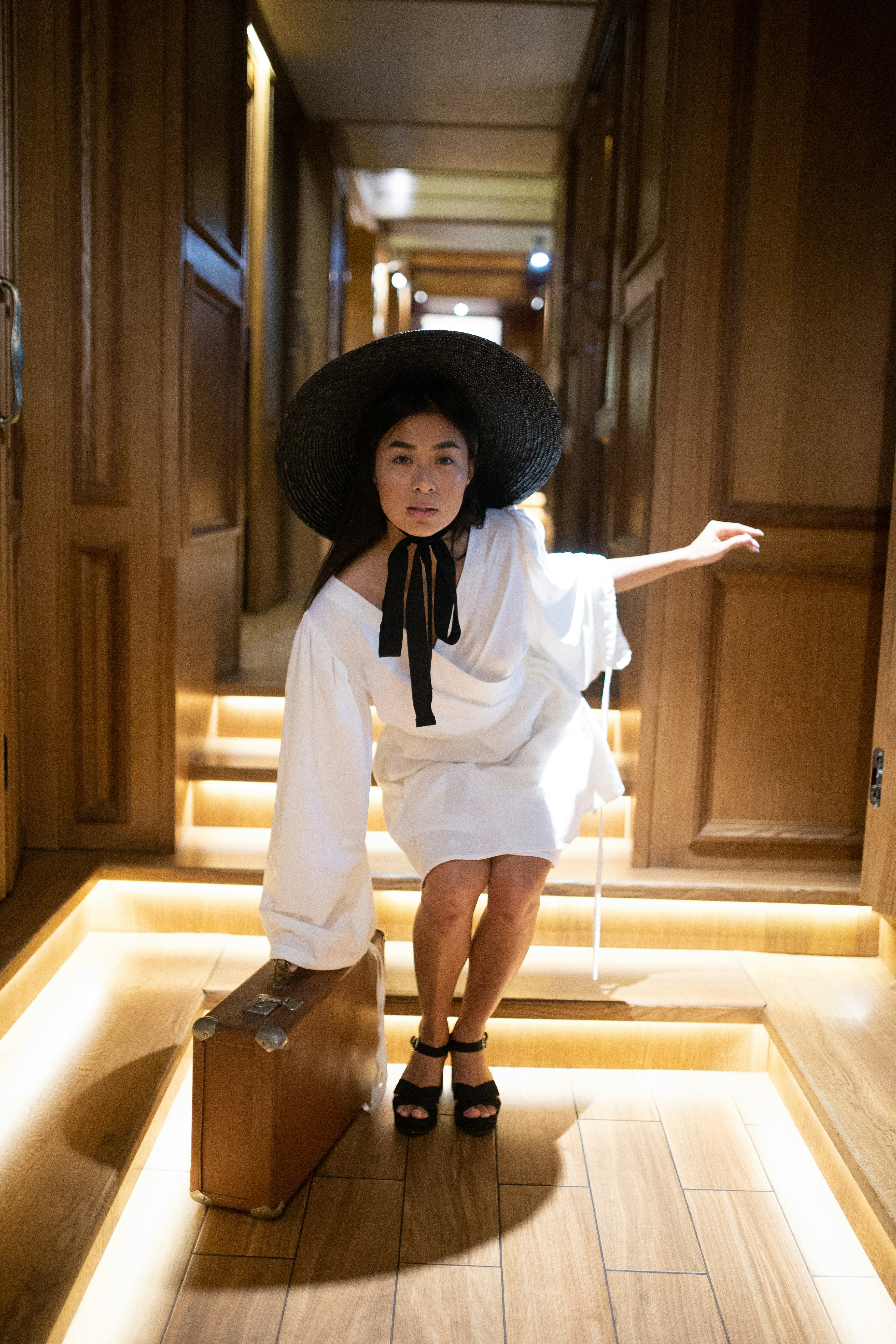 woman carrying suitcase