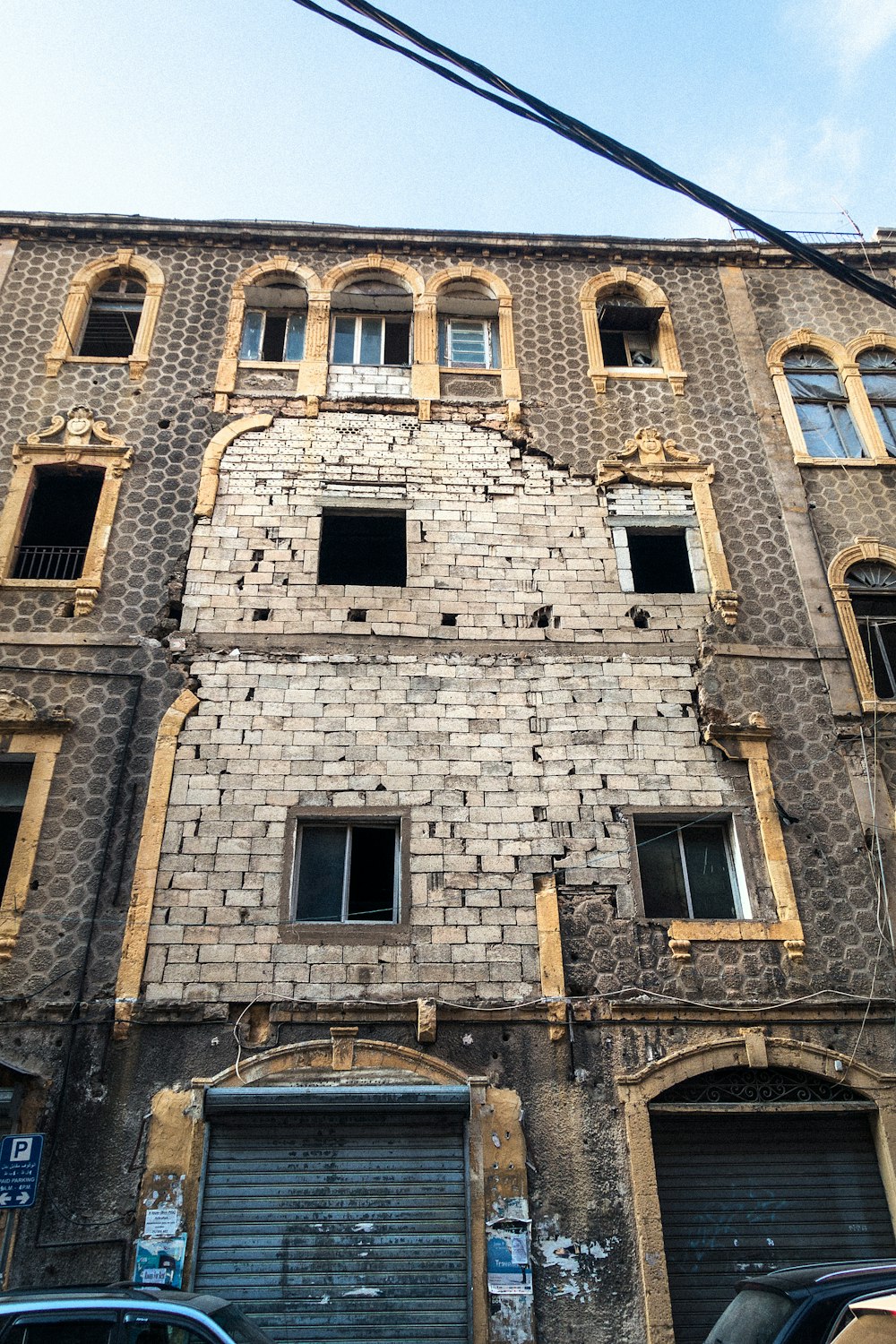 low angle view of brick apartment building under clear sky