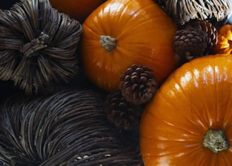 A collection of bold orange-accented metal décor items.
