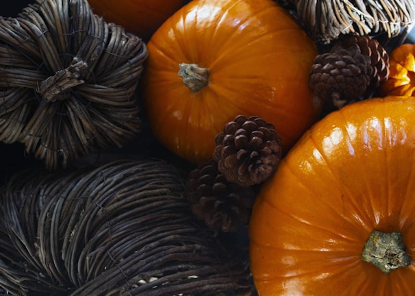 A collection of bold orange-accented metal décor items.