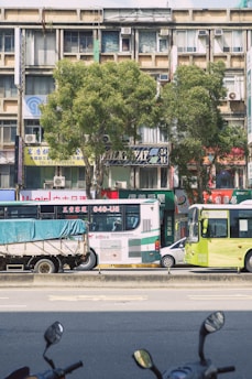 A busy street with various vehicles parked, showcasing the importance of proper documentation.