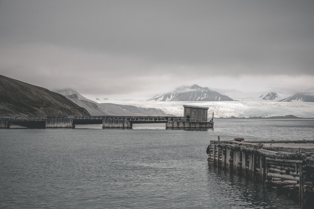 calm sea under cloudy sky