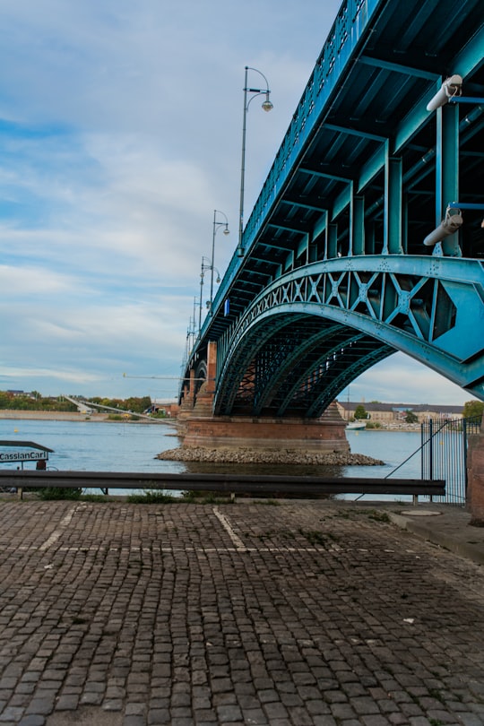 blue concrete bridge at daytime in Frankfurt Germany