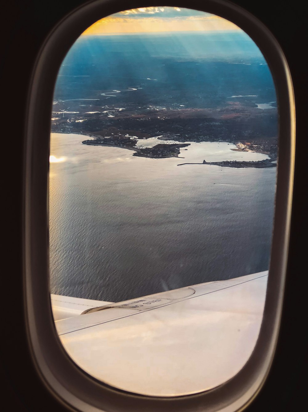 view of the ocean from an airplane window