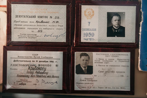 four brown wooden photo frames