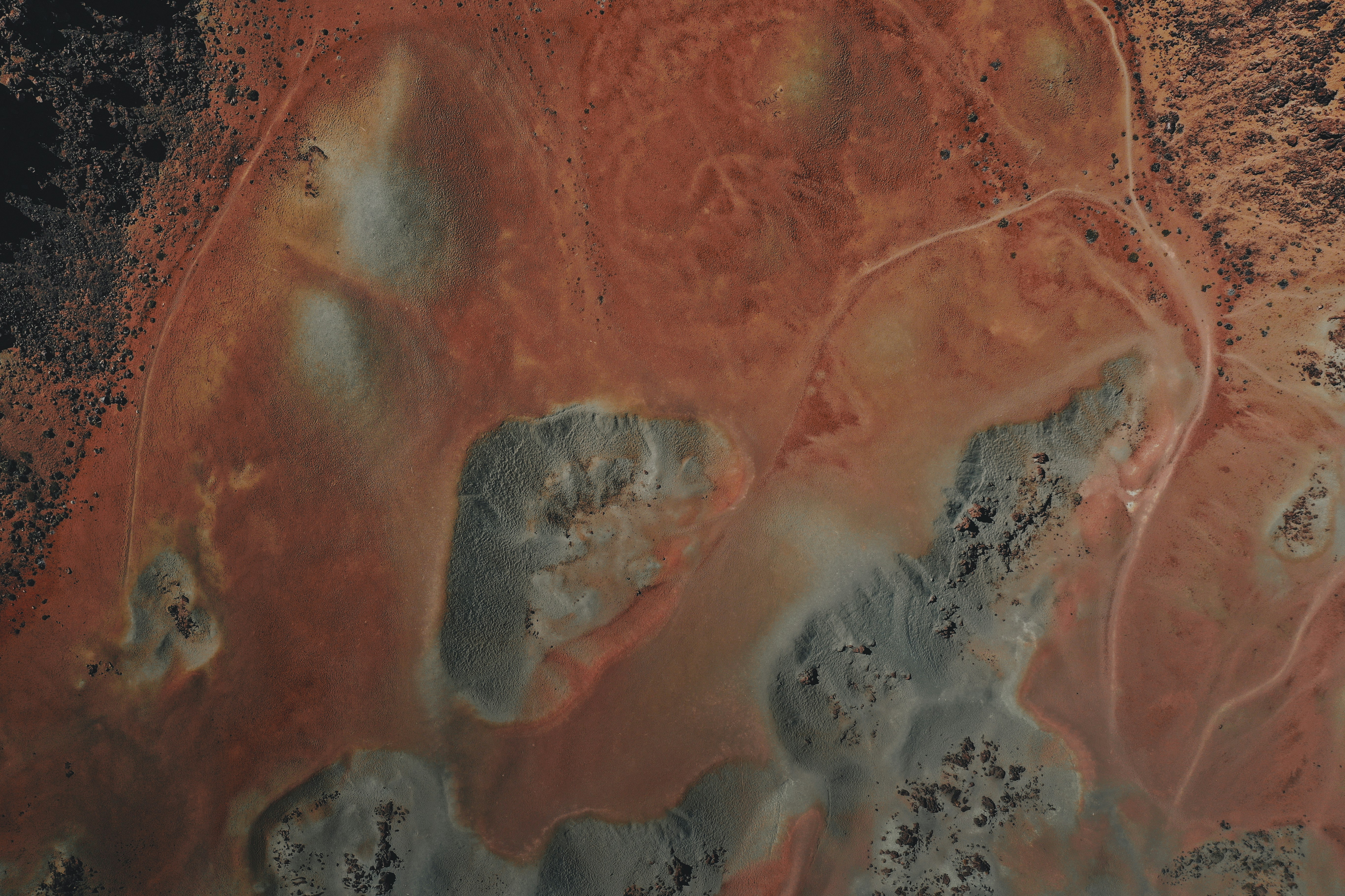 an aerial view of a barren area in the desert