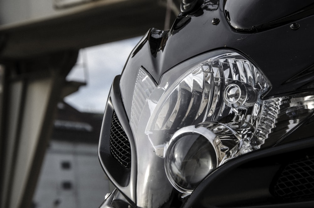 a close up of the headlight of a motorcycle