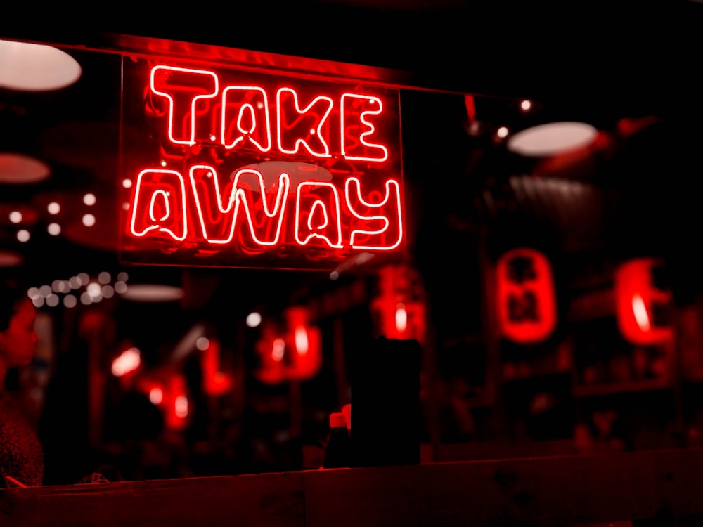 turned-on red Take Away neon sign