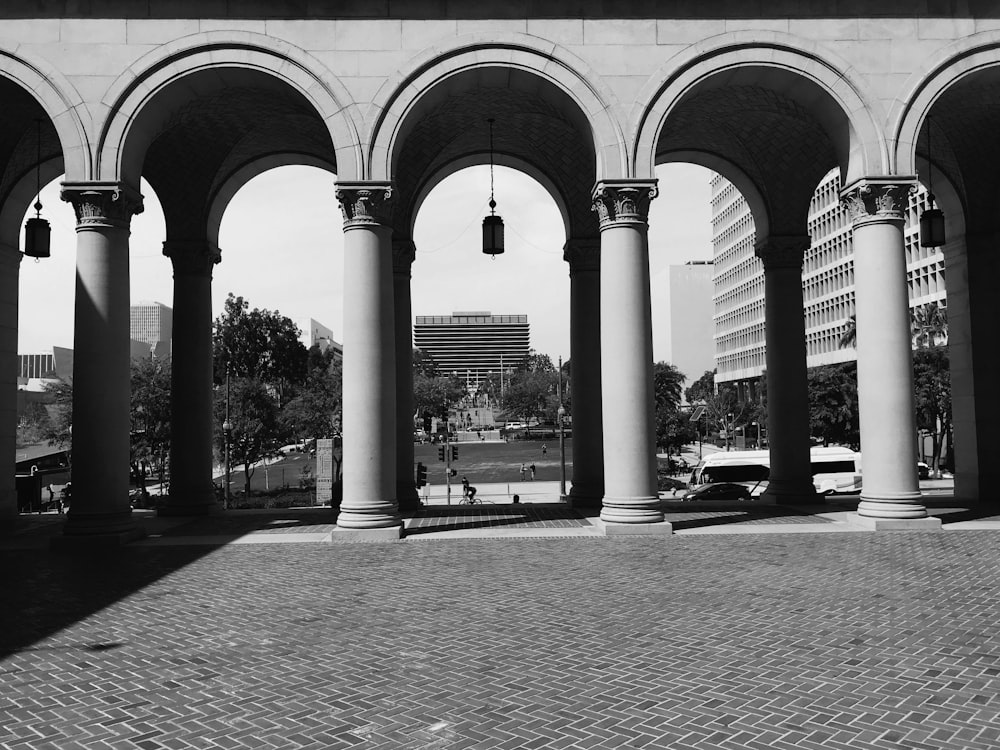 grayscale photography of arch gate at daytime