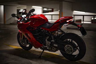 red and black sports bike
