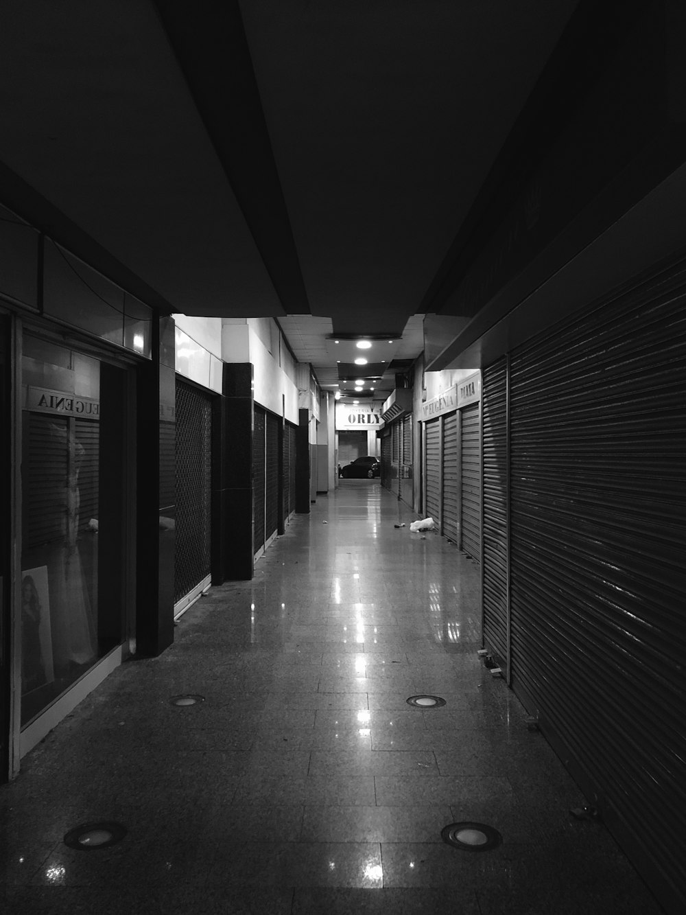 grayscale photography of empty hallway