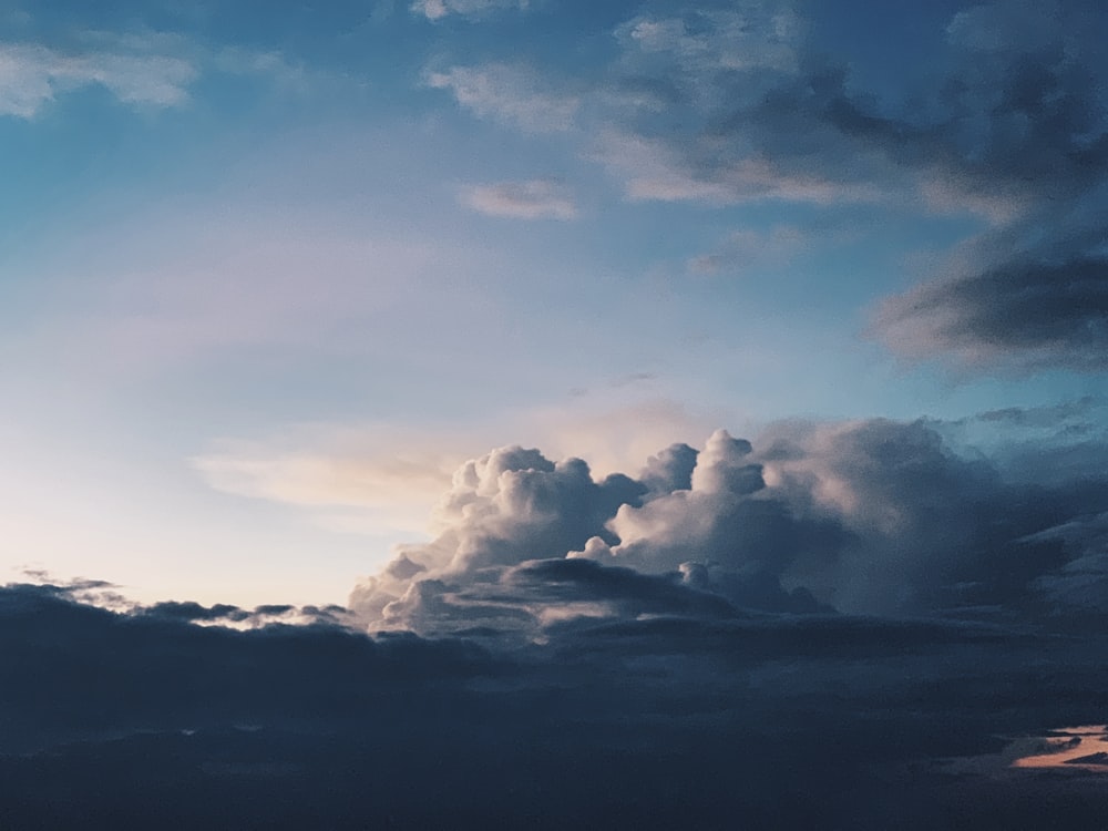 low-angle photography of white clouds and blue sky