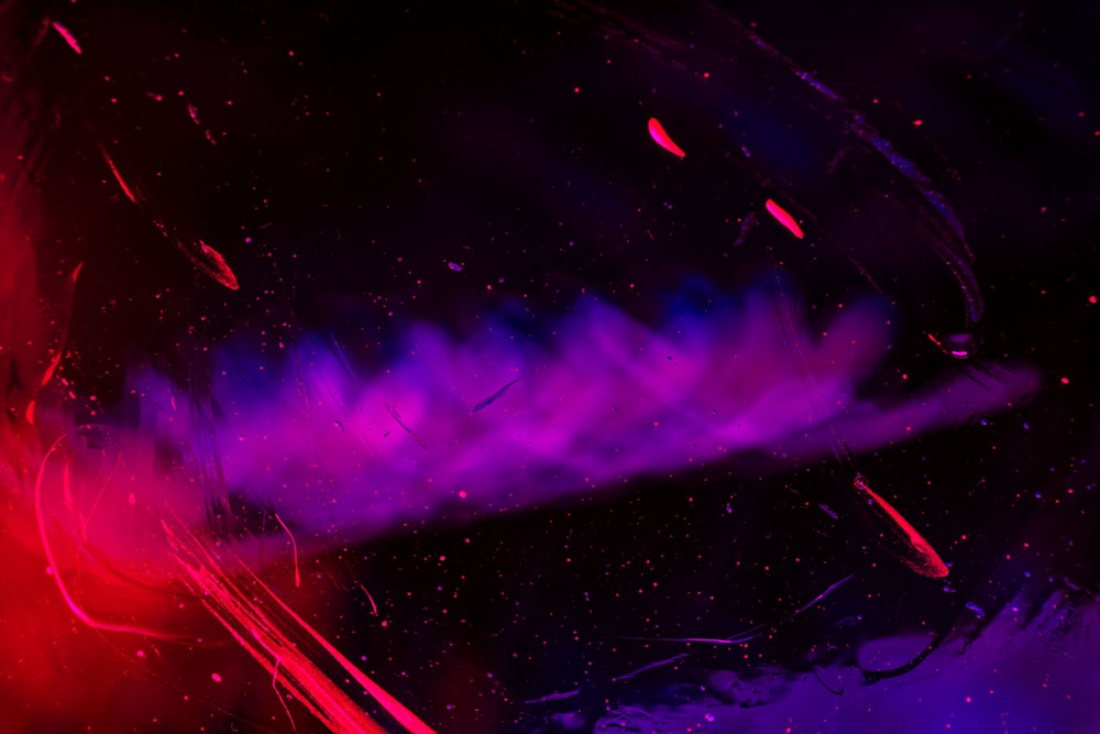 a purple and red background with a black background