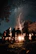 Participants gathered around a cozy fire sharing poems under the stars.