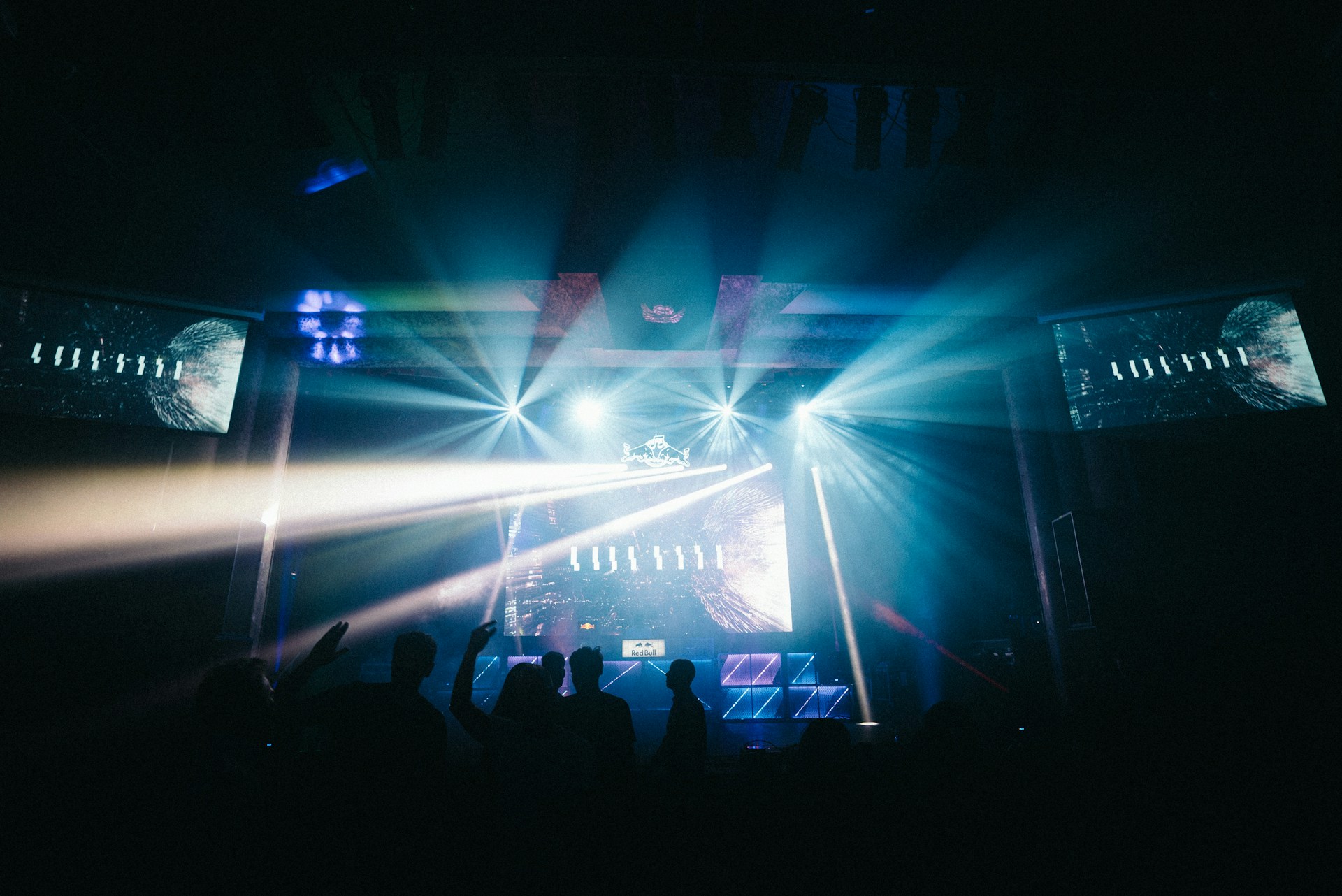 a group of people standing on top of a stage