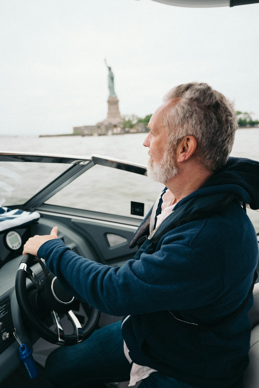 man driving speedboat