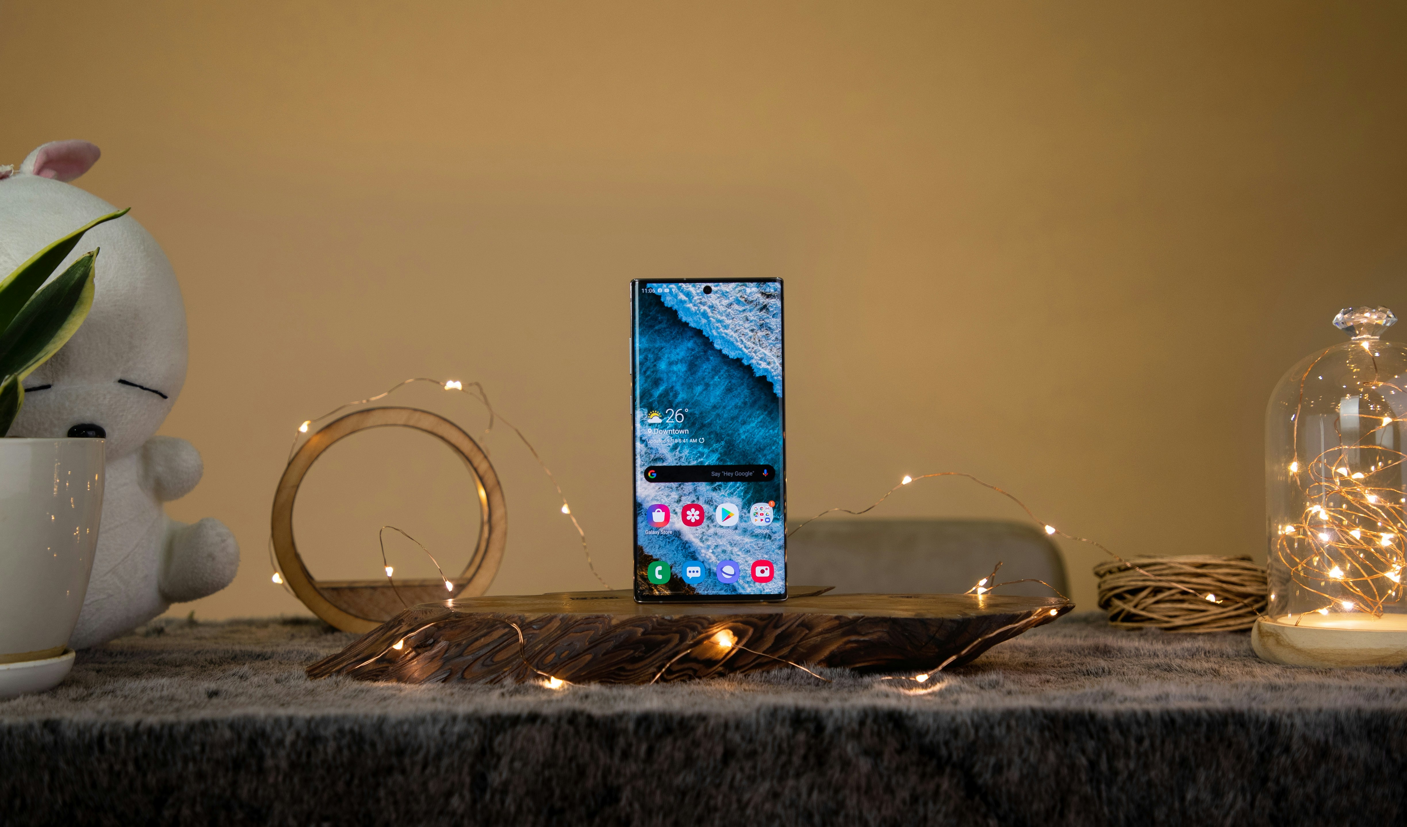 black smartphone on table