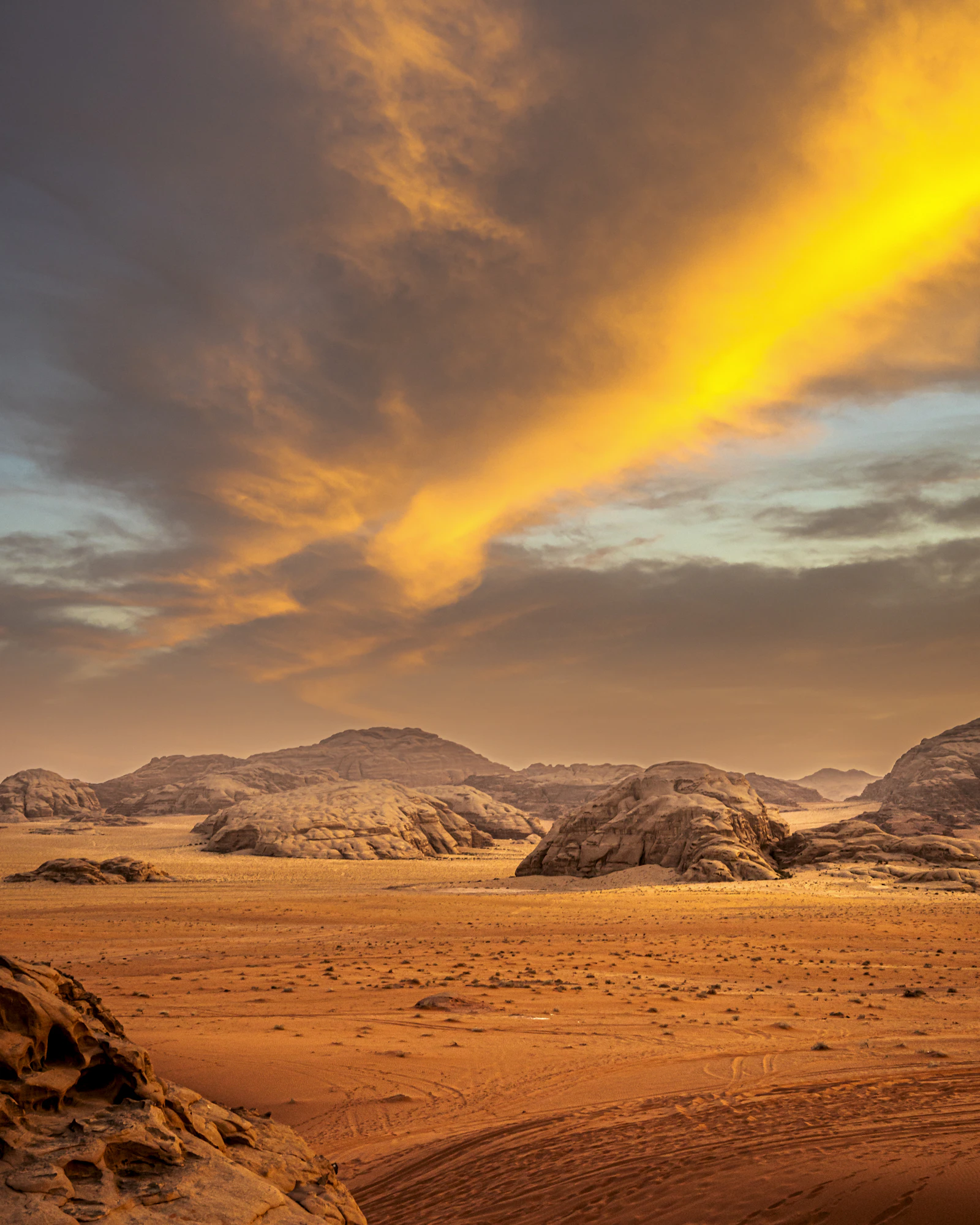A vast desert glowing at dawn