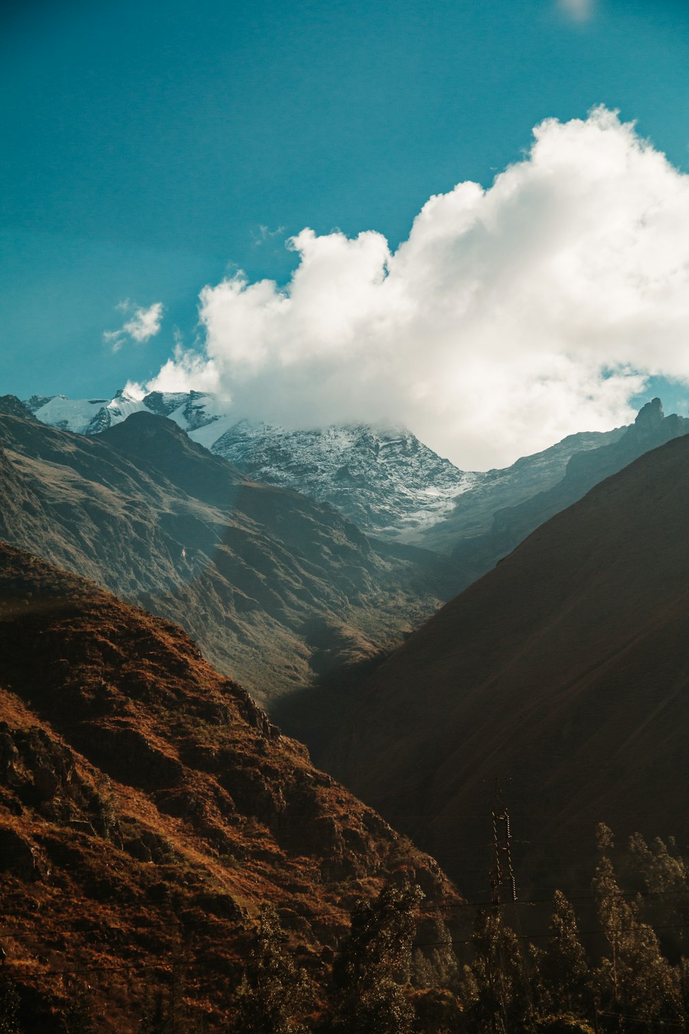 green and brown mountains at daytime